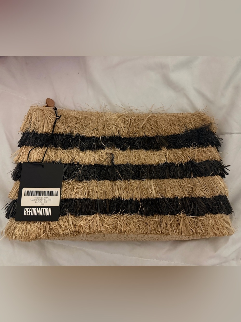 Reformation x Kayu Pinata Oversized Fringe Straw Clutch In Black